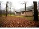 Brick home with a large yard covered in leaves at 4257 Tattersall Dr, Plainfield, IN 46168