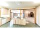 Open kitchen features island with cooktop, offering views into Gathering room at 4257 Tattersall Dr, Plainfield, IN 46168