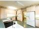 Bright kitchen with ample cabinetry and appliances at 4257 Tattersall Dr, Plainfield, IN 46168