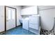 Convenient laundry room with washer, dryer, and built-in cabinets at 4257 Tattersall Dr, Plainfield, IN 46168