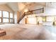 Open living room with kitchen, vaulted ceiling and staircase at 4257 Tattersall Dr, Plainfield, IN 46168