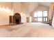 Living room with brick fireplace and large windows at 4257 Tattersall Dr, Plainfield, IN 46168