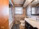 Clean bathroom with a bathtub, shower, and updated vanity at 7125 Linden Dr, Indianapolis, IN 46227