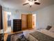 Large bedroom with a dresser and access to another bathroom at 7125 Linden Dr, Indianapolis, IN 46227