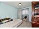 Small bedroom with a bed and wardrobe at 7922 S Sherman Dr, Indianapolis, IN 46237