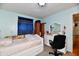 Bedroom with a bed, dresser, and vanity at 7922 S Sherman Dr, Indianapolis, IN 46237