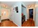 Entryway with laundry closet and wood flooring at 7922 S Sherman Dr, Indianapolis, IN 46237