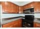 Kitchen with stainless steel appliances at 7922 S Sherman Dr, Indianapolis, IN 46237