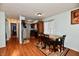 Eat-in kitchen with wood flooring and a four-person table at 7922 S Sherman Dr, Indianapolis, IN 46237