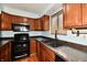Kitchen with stainless steel appliances and sink at 7922 S Sherman Dr, Indianapolis, IN 46237