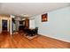 Eat-in kitchen with wood flooring and a four-person table at 7922 S Sherman Dr, Indianapolis, IN 46237