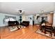 Open concept living and dining area with hardwood floors at 7922 S Sherman Dr, Indianapolis, IN 46237