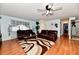 Open concept living and dining area with hardwood floors at 7922 S Sherman Dr, Indianapolis, IN 46237