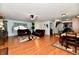 Open concept living and dining area with hardwood floors at 7922 S Sherman Dr, Indianapolis, IN 46237