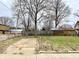 Spacious backyard with a large tree and an old concrete pad at 310 S Pleasant St, Edinburgh, IN 46124