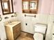 Bathroom features a vanity, toilet and shower at 310 S Pleasant St, Edinburgh, IN 46124