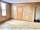 Features wood paneling, a door, and a window at 310 S Pleasant St, Edinburgh, IN 46124