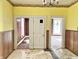 The main dining area shows multiple doorways to other rooms at 310 S Pleasant St, Edinburgh, IN 46124