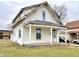 Two story home with front porch and street view at 310 S Pleasant St, Edinburgh, IN 46124