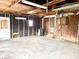 Empty garage with concrete floor and wooden walls, ready for customization at 310 S Pleasant St, Edinburgh, IN 46124