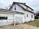 White sided detached garage with single door at 310 S Pleasant St, Edinburgh, IN 46124