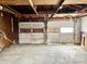 Spacious garage with two large doors, offering ample storage space at 310 S Pleasant St, Edinburgh, IN 46124