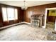 Spacious living room with wood paneling and fireplace at 310 S Pleasant St, Edinburgh, IN 46124