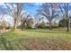 Large grassy backyard with mature trees at 3241 S Pennsylvania St, Indianapolis, IN 46227