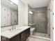 Modern bathroom with marble vanity and walk-in shower at 41 N Rangeline Rd # 7, Carmel, IN 46032