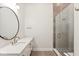 Modern bathroom with a white quartz vanity, a frameless glass shower, and gold fixtures at 41 N Rangeline Rd # 7, Carmel, IN 46032