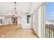 Spacious dining area with hardwood floors and a fireplace at 41 N Rangeline Rd # 7, Carmel, IN 46032