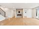 Spacious living area with hardwood floors and a modern fireplace at 41 N Rangeline Rd # 7, Carmel, IN 46032