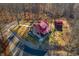 Log cabin with red metal roof and detached shop at 6465 Mt Moriah Rd, Nineveh, IN 46164