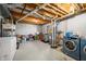 Unfinished basement laundry area with washer, dryer and storage at 6465 Mt Moriah Rd, Nineveh, IN 46164