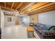 Finished basement with stone fireplace, sitting area, and dining space at 6465 Mt Moriah Rd, Nineveh, IN 46164
