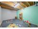Playroom in the basement with toys, rug, and built in shelving at 6465 Mt Moriah Rd, Nineveh, IN 46164