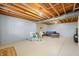 Finished basement recreation area with stone fireplace and plenty of space at 6465 Mt Moriah Rd, Nineveh, IN 46164