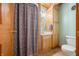 Clean bathroom with shower, vanity, and built-in storage at 6465 Mt Moriah Rd, Nineveh, IN 46164