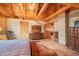 Bright bedroom featuring hardwood floors, wooden beams, and ample closet space at 6465 Mt Moriah Rd, Nineveh, IN 46164