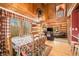 Spacious dining area with wood floors and a view of the living room at 6465 Mt Moriah Rd, Nineveh, IN 46164