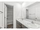 Double vanity bathroom with dark brown cabinets at 1782 N Clearwater Dr, Greenfield, IN 46140