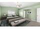 Main bedroom with vaulted ceiling, neutral walls, and large window at 1782 N Clearwater Dr, Greenfield, IN 46140