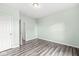 Bright bedroom featuring light walls and wood-look flooring at 1782 N Clearwater Dr, Greenfield, IN 46140
