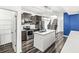 Modern kitchen with island, stainless steel appliances, and pantry at 1782 N Clearwater Dr, Greenfield, IN 46140