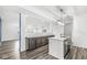 Modern kitchen with an island, stainless steel appliances, and dark brown cabinets at 1782 N Clearwater Dr, Greenfield, IN 46140