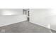Bright loft area with grey carpeting and ample space at 1782 N Clearwater Dr, Greenfield, IN 46140
