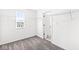 Large walk-in closet with grey carpeting and built in shelving at 1782 N Clearwater Dr, Greenfield, IN 46140