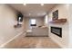 Finished basement with a cozy sitting area and fireplace at 2355 W State Road 234, Fortville, IN 46040