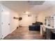 Finished basement offering a cozy sitting area and home office at 2355 W State Road 234, Fortville, IN 46040