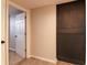 Unfinished basement with extra storage space and door at 2355 W State Road 234, Fortville, IN 46040